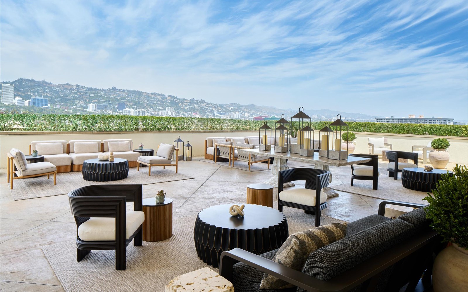 The rooftop terrace by day, looking over the hedge to the houses on the Hollywood Hills