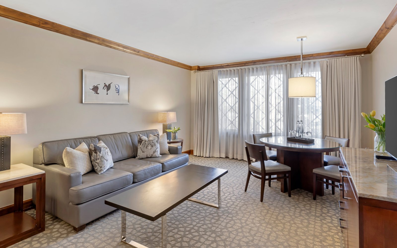 The living area of an Executive suite, with its own seating and dining space